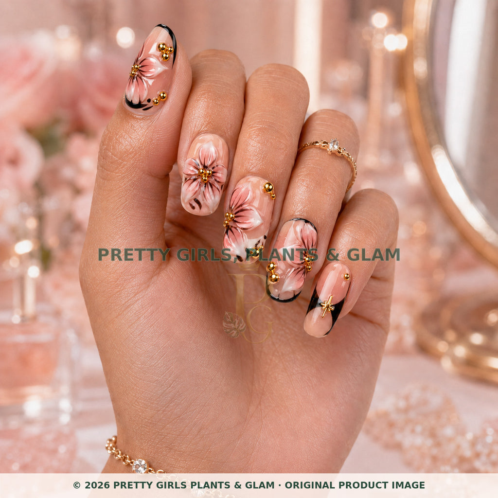Blush Floral Medallion press-on nails modeled upright on a hand
