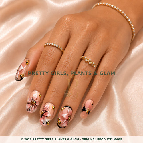 Blush Floral Medallion press-on nails modeled on a hand