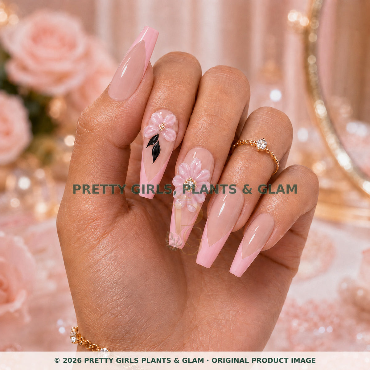 Blush Petal press-on nails modeled upright on a hand