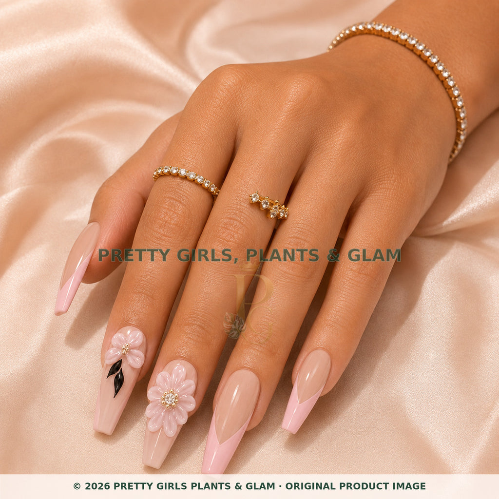 Blush Petal press-on nails modeled on a hand