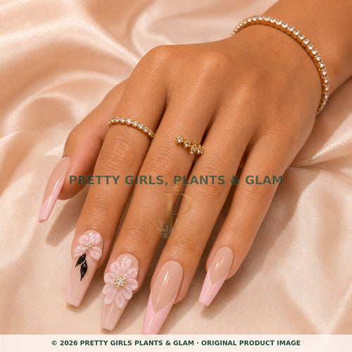 Blush Petal press-on nails modeled on a hand