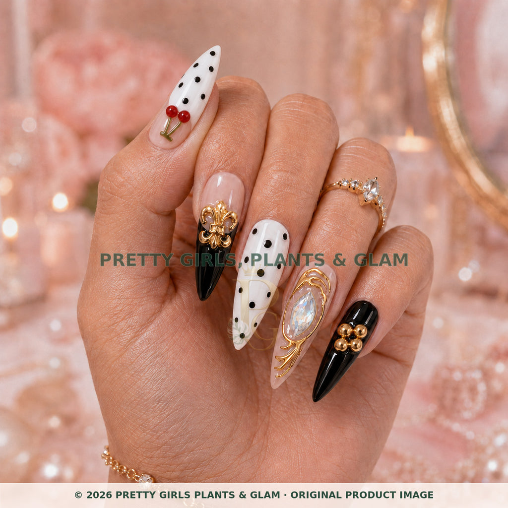 Cherry Royale press-on nails modeled upright on a hand