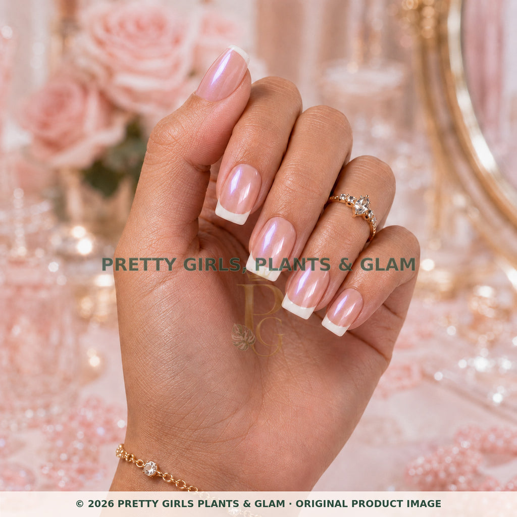 Classic Pink French press-on nails modeled upright on a hand