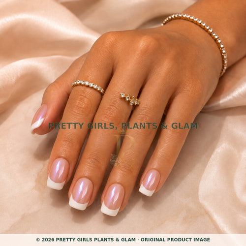 Classic Pink French press-on nails modeled on a hand