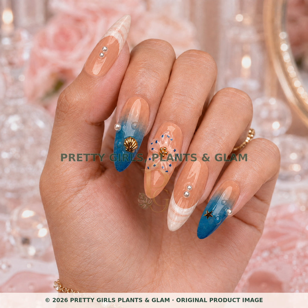 Coastal Bloom press-on nails modeled upright on a hand