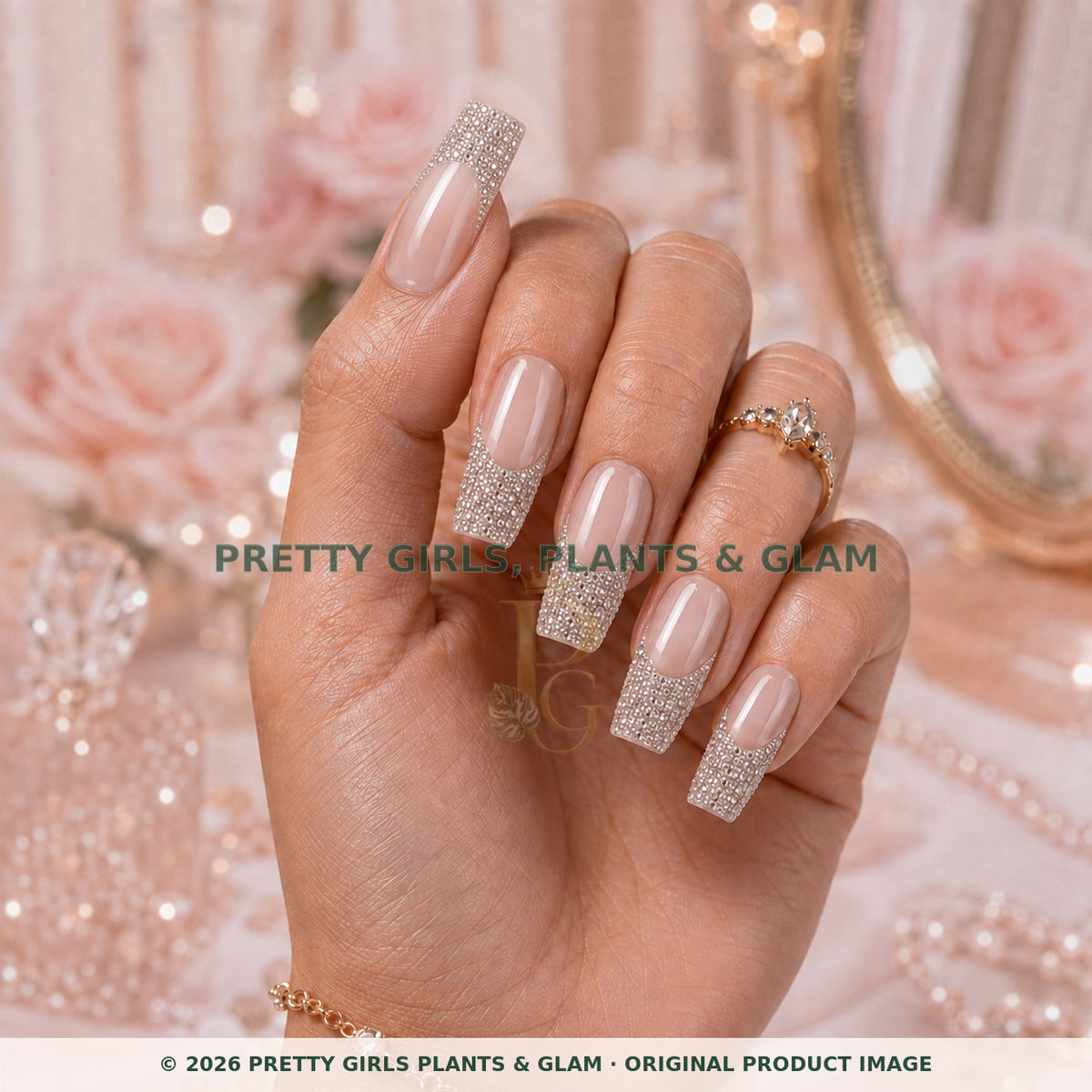 Crystal Champagne press-on nails modeled upright on a hand