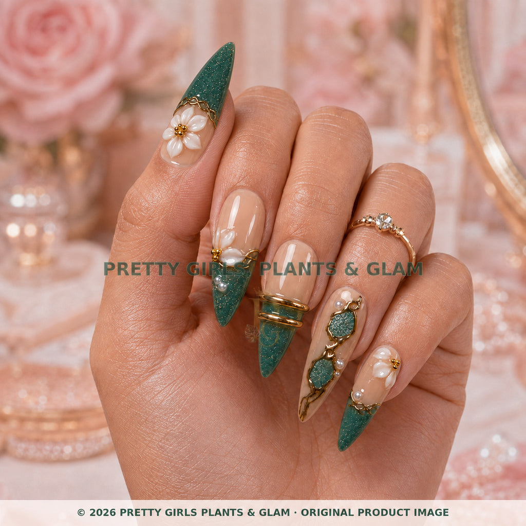 Emerald Pearl press-on nails modeled upright on a hand