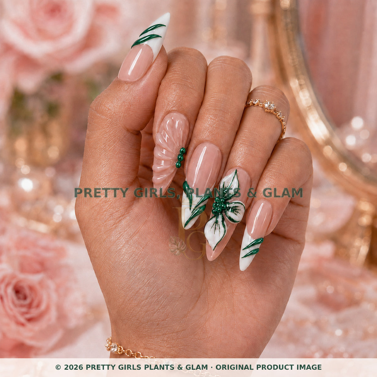 Golden Petal press-on nails modeled upright on a hand