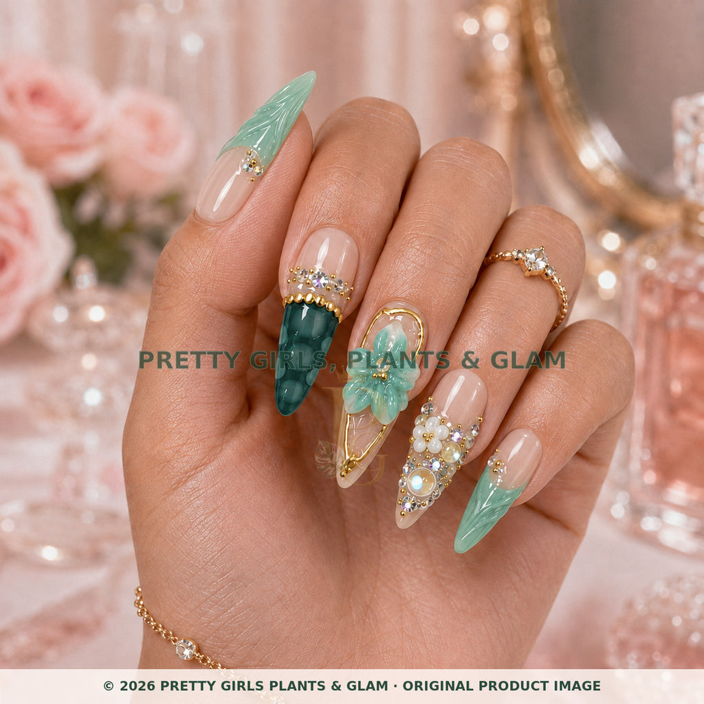 Jade Garden press-on nails modeled upright on a hand