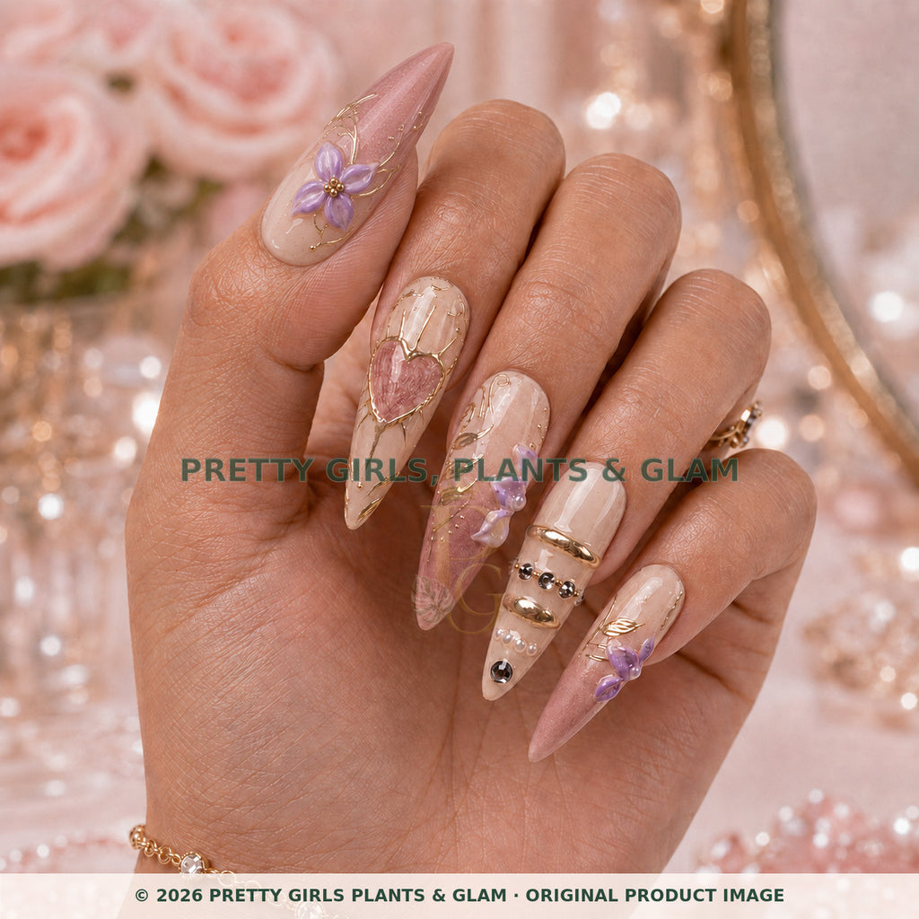 Lavender Romance press-on nails modeled upright on a hand