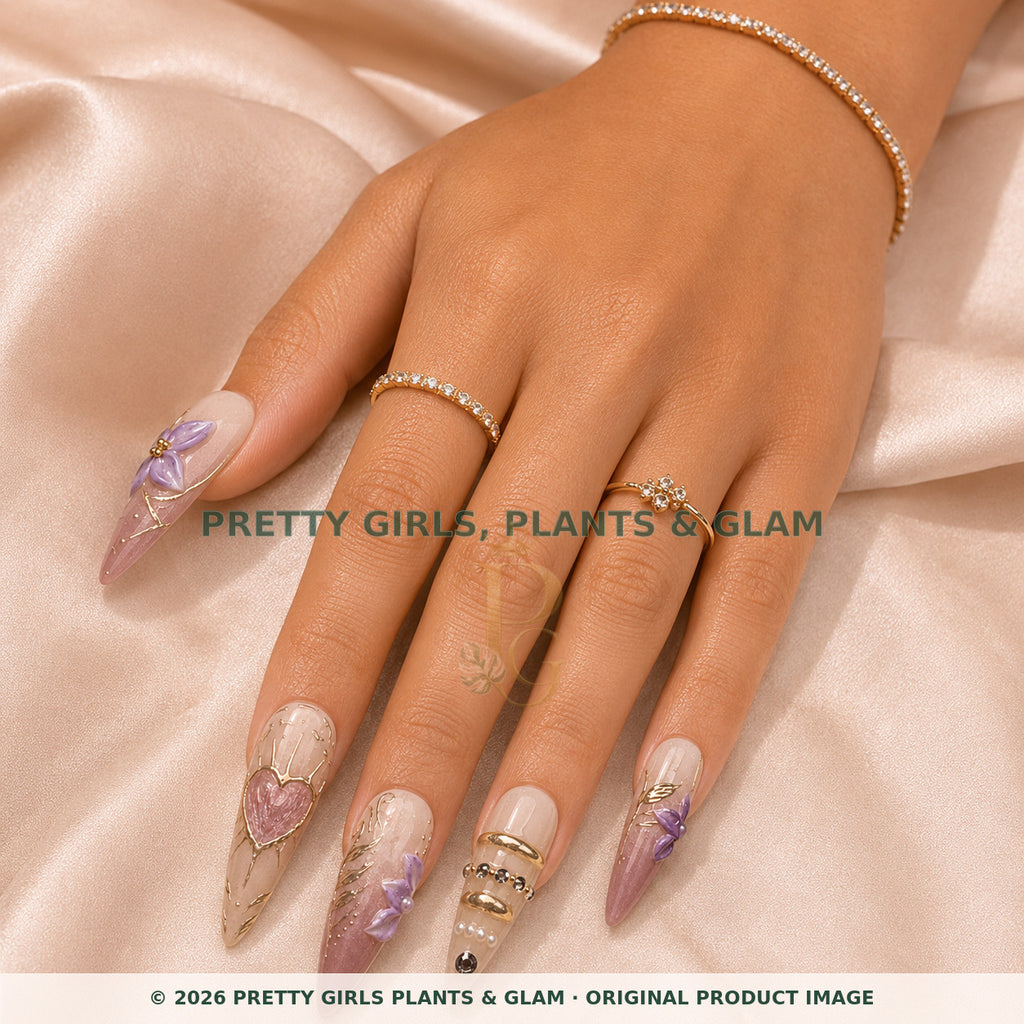 Lavender Romance press-on nails modeled on a hand