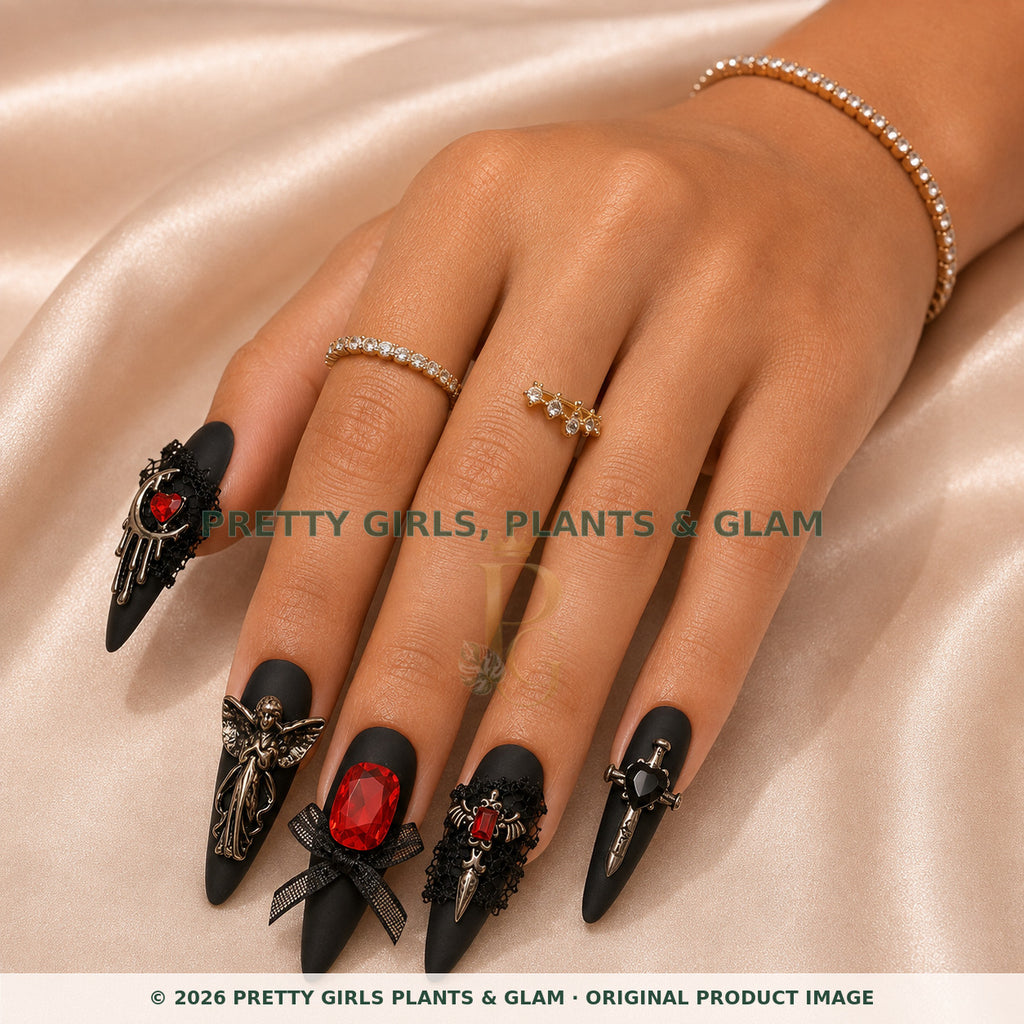 Midnight Devotion press-on nails modeled on a hand