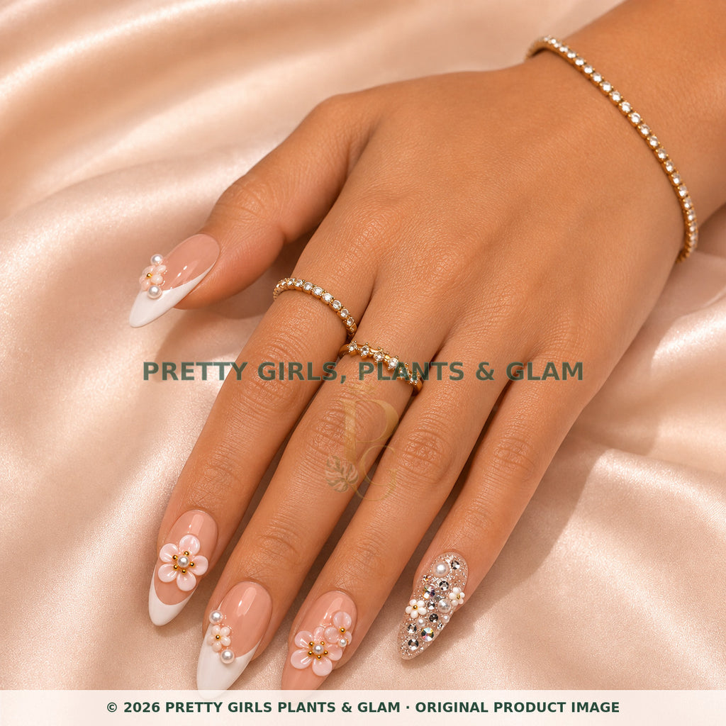Pink Crystal Bloom press-on nails modeled on a hand