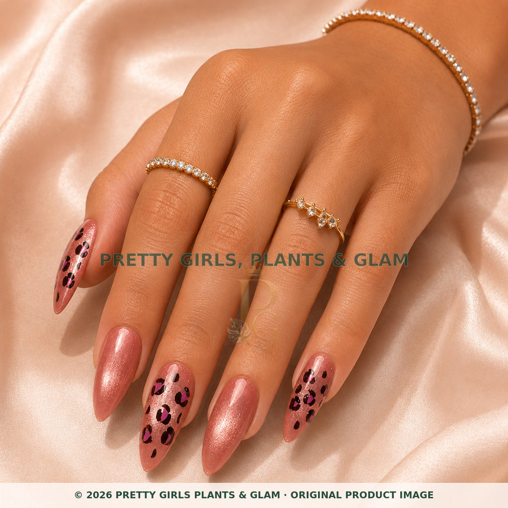 Rose Leopard press-on nails modeled on a hand