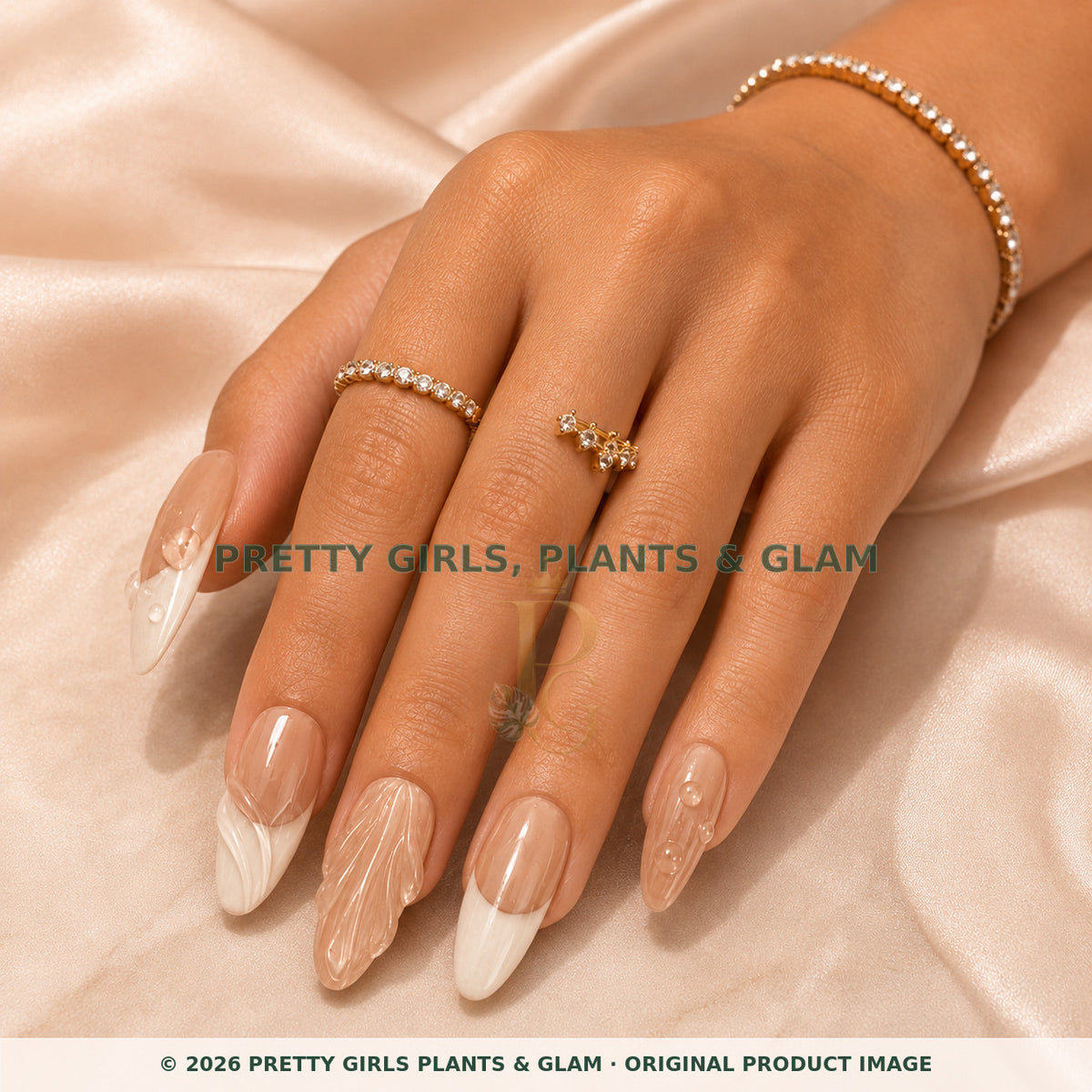 Sculpted Pearl French press-on nails modeled on a hand