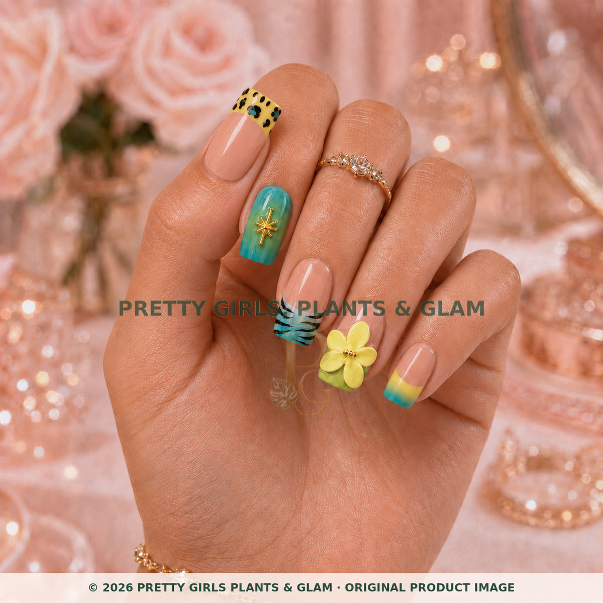 Tropical Garden press-on nails modeled upright on a hand